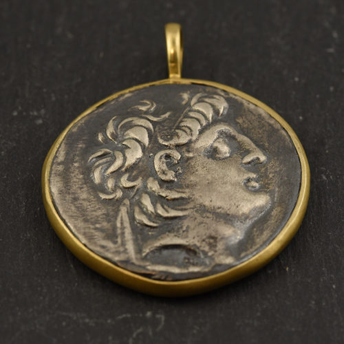 Small 18 KT Gold and Sterling Coin